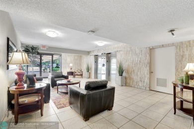 QUIET COZY RARELY AVAILABLE 2/2 KING OVERSIZED PENTHOUSE W/ENCL on Palm-Aire Country Club and Resort - The Oaks in Florida - for sale on GolfHomes.com, golf home, golf lot