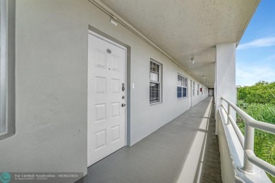 QUIET COZY RARELY AVAILABLE 2/2 KING OVERSIZED PENTHOUSE W/ENCL on Palm-Aire Country Club and Resort - The Oaks in Florida - for sale on GolfHomes.com, golf home, golf lot