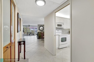 QUIET COZY RARELY AVAILABLE 2/2 KING OVERSIZED PENTHOUSE W/ENCL on Palm-Aire Country Club and Resort - The Oaks in Florida - for sale on GolfHomes.com, golf home, golf lot