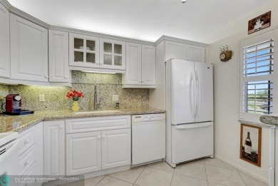 QUIET COZY RARELY AVAILABLE 2/2 KING OVERSIZED PENTHOUSE W/ENCL on Palm-Aire Country Club and Resort - The Oaks in Florida - for sale on GolfHomes.com, golf home, golf lot