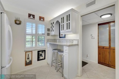 QUIET COZY RARELY AVAILABLE 2/2 KING OVERSIZED PENTHOUSE W/ENCL on Palm-Aire Country Club and Resort - The Oaks in Florida - for sale on GolfHomes.com, golf home, golf lot