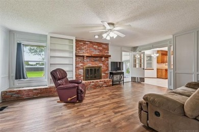 This spacious home sits on a fully fenced 0.61-acre lot and on Forest Ridge Golf Club in Oklahoma - for sale on GolfHomes.com, golf home, golf lot