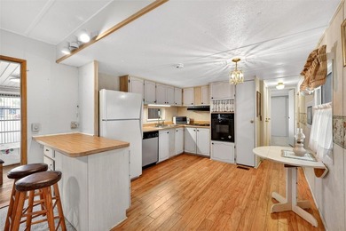 Perfectly positioned in the highly desirable community of on Bay Tree Golf Course in Florida - for sale on GolfHomes.com, golf home, golf lot