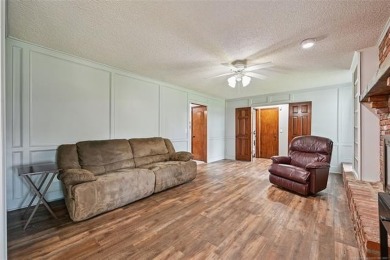 This spacious home sits on a fully fenced 0.61-acre lot and on Forest Ridge Golf Club in Oklahoma - for sale on GolfHomes.com, golf home, golf lot