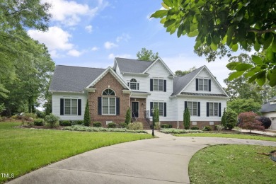 Live luxuriously in the heart of Holly Springs' sought-after on Devils Ridge Golf Club in North Carolina - for sale on GolfHomes.com, golf home, golf lot