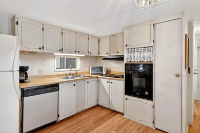 Perfectly positioned in the highly desirable community of on Bay Tree Golf Course in Florida - for sale on GolfHomes.com, golf home, golf lot