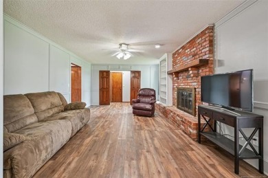 This spacious home sits on a fully fenced 0.61-acre lot and on Forest Ridge Golf Club in Oklahoma - for sale on GolfHomes.com, golf home, golf lot