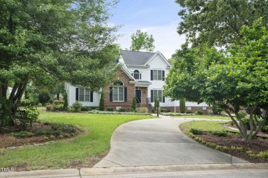 Live luxuriously in the heart of Holly Springs' sought-after on Devils Ridge Golf Club in North Carolina - for sale on GolfHomes.com, golf home, golf lot