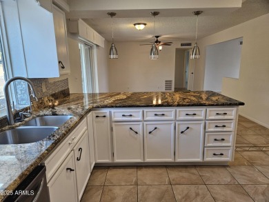 A must-see! Charming updated 2BR, 1.75BA ''600'' model in on Sunland Village Golf Club in Arizona - for sale on GolfHomes.com, golf home, golf lot