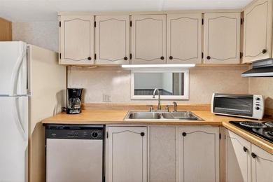 Perfectly positioned in the highly desirable community of on Bay Tree Golf Course in Florida - for sale on GolfHomes.com, golf home, golf lot