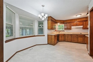This spacious home sits on a fully fenced 0.61-acre lot and on Forest Ridge Golf Club in Oklahoma - for sale on GolfHomes.com, golf home, golf lot