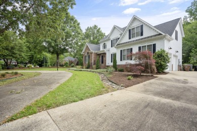 Live luxuriously in the heart of Holly Springs' sought-after on Devils Ridge Golf Club in North Carolina - for sale on GolfHomes.com, golf home, golf lot