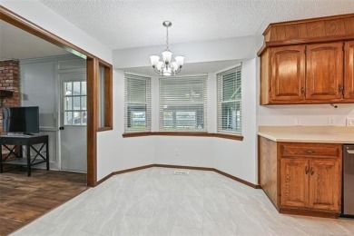 This spacious home sits on a fully fenced 0.61-acre lot and on Forest Ridge Golf Club in Oklahoma - for sale on GolfHomes.com, golf home, golf lot