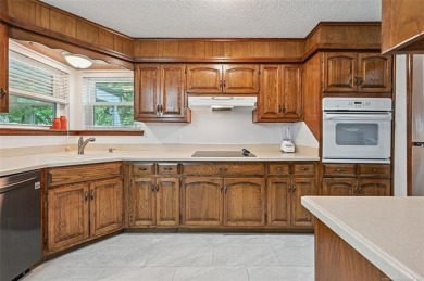 This spacious home sits on a fully fenced 0.61-acre lot and on Forest Ridge Golf Club in Oklahoma - for sale on GolfHomes.com, golf home, golf lot