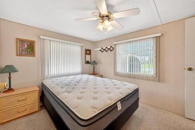 Perfectly positioned in the highly desirable community of on Bay Tree Golf Course in Florida - for sale on GolfHomes.com, golf home, golf lot