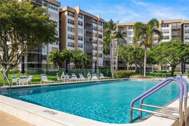 Lovely condo offers a perfect blend of comfort and convenience on Pembroke Lakes Golf Club in Florida - for sale on GolfHomes.com, golf home, golf lot