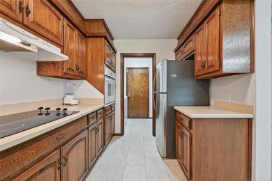 This spacious home sits on a fully fenced 0.61-acre lot and on Forest Ridge Golf Club in Oklahoma - for sale on GolfHomes.com, golf home, golf lot