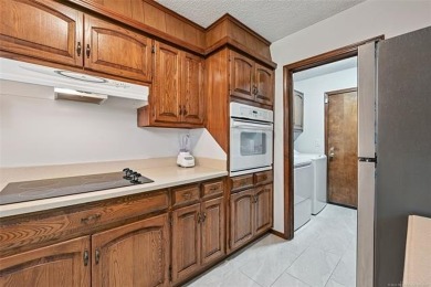 This spacious home sits on a fully fenced 0.61-acre lot and on Forest Ridge Golf Club in Oklahoma - for sale on GolfHomes.com, golf home, golf lot