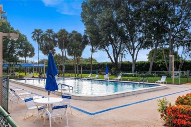 Lovely condo offers a perfect blend of comfort and convenience on Pembroke Lakes Golf Club in Florida - for sale on GolfHomes.com, golf home, golf lot