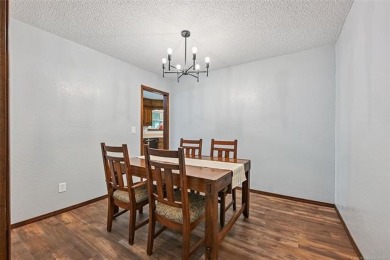 This spacious home sits on a fully fenced 0.61-acre lot and on Forest Ridge Golf Club in Oklahoma - for sale on GolfHomes.com, golf home, golf lot