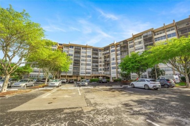 Lovely condo offers a perfect blend of comfort and convenience on Pembroke Lakes Golf Club in Florida - for sale on GolfHomes.com, golf home, golf lot