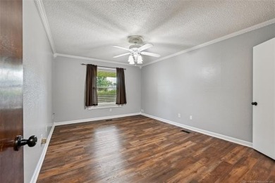 This spacious home sits on a fully fenced 0.61-acre lot and on Forest Ridge Golf Club in Oklahoma - for sale on GolfHomes.com, golf home, golf lot