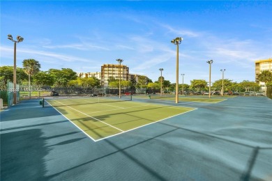 Lovely condo offers a perfect blend of comfort and convenience on Pembroke Lakes Golf Club in Florida - for sale on GolfHomes.com, golf home, golf lot