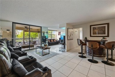 Lovely condo offers a perfect blend of comfort and convenience on Pembroke Lakes Golf Club in Florida - for sale on GolfHomes.com, golf home, golf lot