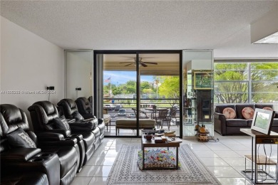 Lovely condo offers a perfect blend of comfort and convenience on Pembroke Lakes Golf Club in Florida - for sale on GolfHomes.com, golf home, golf lot