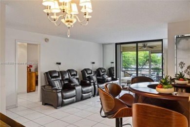 Lovely condo offers a perfect blend of comfort and convenience on Pembroke Lakes Golf Club in Florida - for sale on GolfHomes.com, golf home, golf lot