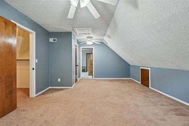 This spacious home sits on a fully fenced 0.61-acre lot and on Forest Ridge Golf Club in Oklahoma - for sale on GolfHomes.com, golf home, golf lot