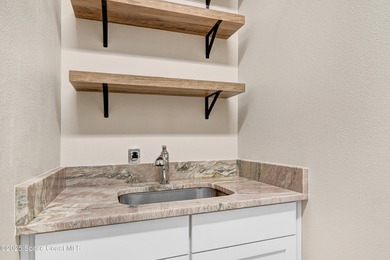 Stunning Turnkey Home in the Heart of Viera! Located in on Duran Golf Course in Florida - for sale on GolfHomes.com, golf home, golf lot