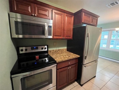 Enjoy your Retirement in this Sunny and Bright Greenbriar Condo on Leisure Village Golf Course in New York - for sale on GolfHomes.com, golf home, golf lot