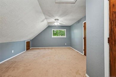 This spacious home sits on a fully fenced 0.61-acre lot and on Forest Ridge Golf Club in Oklahoma - for sale on GolfHomes.com, golf home, golf lot