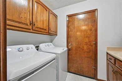 This spacious home sits on a fully fenced 0.61-acre lot and on Forest Ridge Golf Club in Oklahoma - for sale on GolfHomes.com, golf home, golf lot