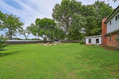 This spacious home sits on a fully fenced 0.61-acre lot and on Forest Ridge Golf Club in Oklahoma - for sale on GolfHomes.com, golf home, golf lot