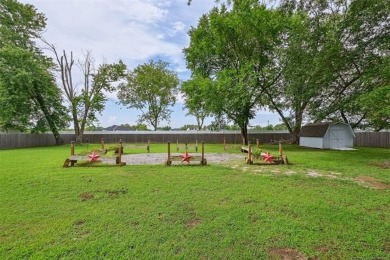 This spacious home sits on a fully fenced 0.61-acre lot and on Forest Ridge Golf Club in Oklahoma - for sale on GolfHomes.com, golf home, golf lot