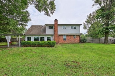 This spacious home sits on a fully fenced 0.61-acre lot and on Forest Ridge Golf Club in Oklahoma - for sale on GolfHomes.com, golf home, golf lot