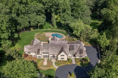 Experience refined living at this exquisite English country on Roxiticus Golf Club in New Jersey - for sale on GolfHomes.com, golf home, golf lot