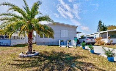 Wow! A custom 1404 sqft canal home close to the main pool! Built on Barefoot Bay Golf Course in Florida - for sale on GolfHomes.com, golf home, golf lot