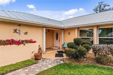 Beautifully maintained concrete block home with split plan on The American Golf Club in Florida - for sale on GolfHomes.com, golf home, golf lot
