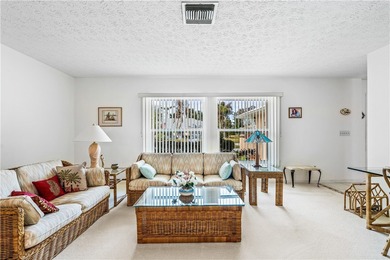 Beautifully maintained concrete block home with split plan on The American Golf Club in Florida - for sale on GolfHomes.com, golf home, golf lot