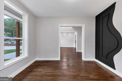 Step into flawless modern luxury at this brand-new custom-built on East Lake Golf Club in Georgia - for sale on GolfHomes.com, golf home, golf lot