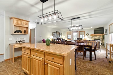 Pride of ownership is evident in this meticulously maintained on Northern Bay Golf Resort and Marina in Wisconsin - for sale on GolfHomes.com, golf home, golf lot