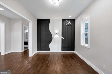 Step into flawless modern luxury at this brand-new custom-built on East Lake Golf Club in Georgia - for sale on GolfHomes.com, golf home, golf lot