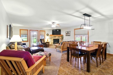 Pride of ownership is evident in this meticulously maintained on Northern Bay Golf Resort and Marina in Wisconsin - for sale on GolfHomes.com, golf home, golf lot