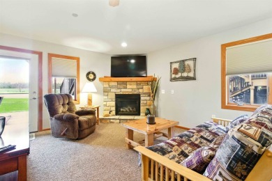 Pride of ownership is evident in this meticulously maintained on Northern Bay Golf Resort and Marina in Wisconsin - for sale on GolfHomes.com, golf home, golf lot
