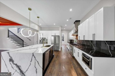 Step into flawless modern luxury at this brand-new custom-built on East Lake Golf Club in Georgia - for sale on GolfHomes.com, golf home, golf lot