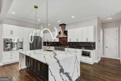 Step into flawless modern luxury at this brand-new custom-built on East Lake Golf Club in Georgia - for sale on GolfHomes.com, golf home, golf lot
