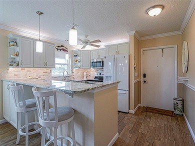 Elegantly updated 2/2 (B) unit in Vista Royale. Enjoy the on The American Golf Club in Florida - for sale on GolfHomes.com, golf home, golf lot